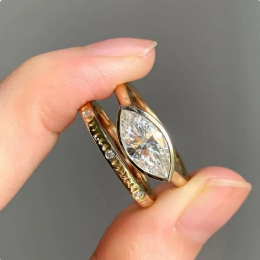 /public/photos/live/Solitaire Marquise Cut Bezel Moissanite Matching Ring Set 564 (3).webp